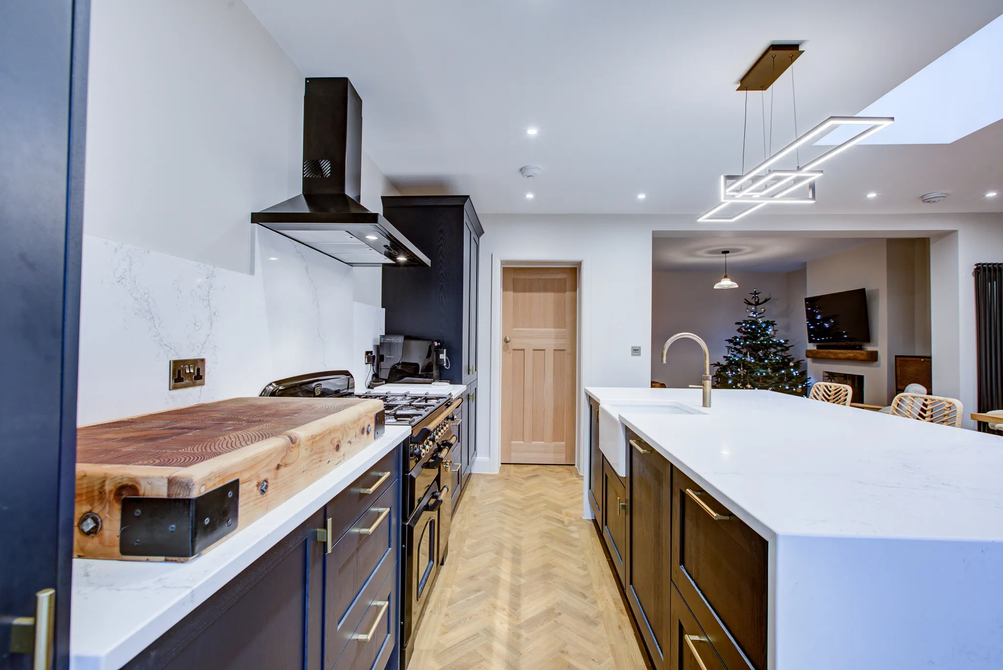 A kitchen with a stove top oven next to a counter.